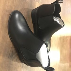 CityClassified- Over the ankle black boots. About 1 1/2 inch heel.